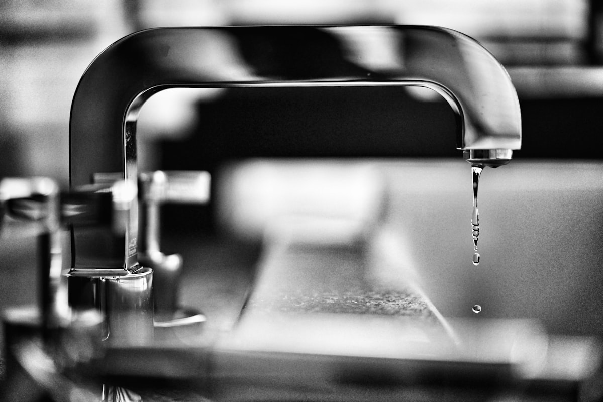 Close up of a dripping faucet during leak detection